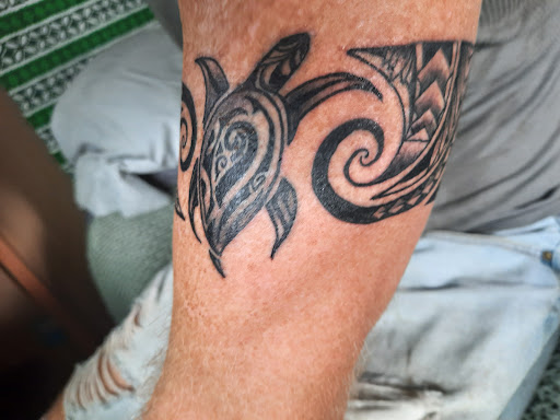 Explore man leg tattoo ideas, creative tattoo ideas in Pahoa, available at Electric Jungle Tattoo