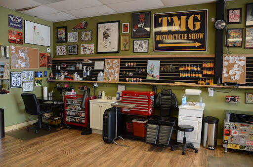 Tattoo Shop «Tattoo Machine Gun- Clark», reviews and photos, 1705 Charlestown New Albany Rd a, Jeffersonville, IN 47130, USA