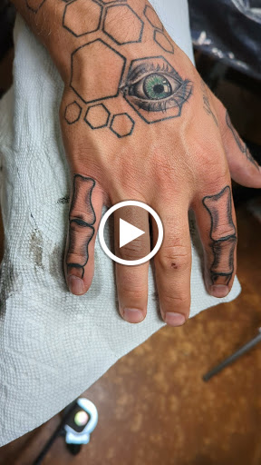 Explore photographer tattoo ideas, creative tattoo ideas in Longwood, available at Trinity Tattoo Co Inc