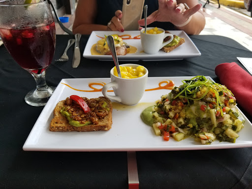 Latin American Restaurant «De La Vega Restaurante y Galeria», reviews and photos, 128 N Woodland Blvd, DeLand, FL 32720, USA