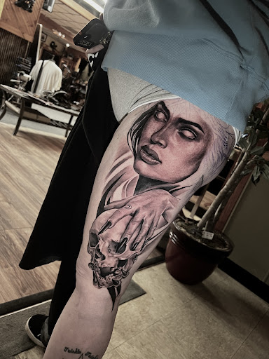 Explore flower bouquet tattoo ideas, creative tattoo ideas in Marion, available at Saged souls tattoo collective