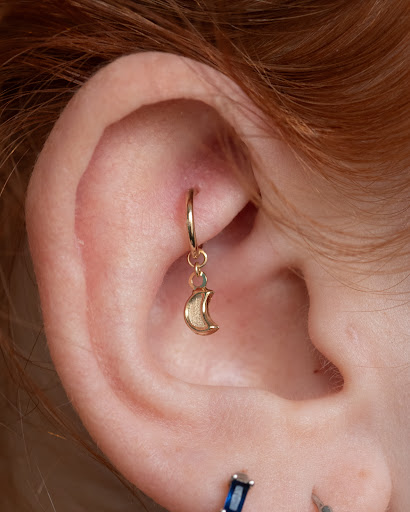 Explore swimming tattoo ideas, creative tattoo ideas in Boston, available at Arcadia Body Piercing