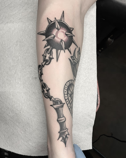 Explore roman numeral birthday tattoo ideas, creative tattoo ideas in Edgewood, available at Wild Coyote Tattoo