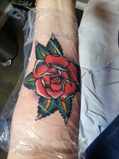 Explore bald head tattoo ideas, creative tattoo ideas in Paducah, available at Third Moon Tattoos