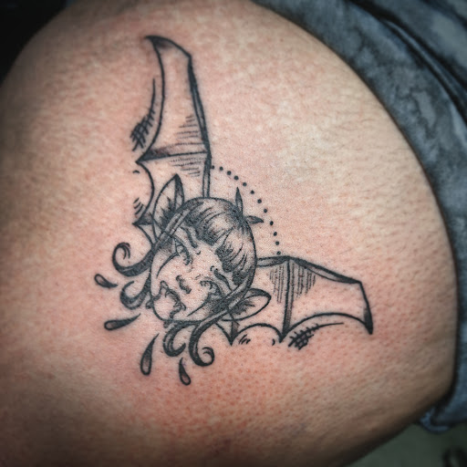 Explore silly tattoo ideas, creative tattoo ideas in Medina, available at Art In Motion Inc Tattooing
