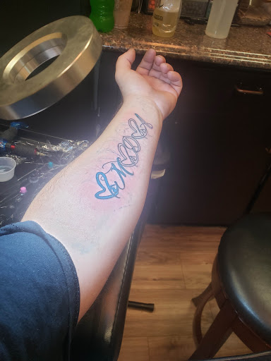 Explore horseshoe tattoo ideas, creative tattoo ideas in Cincinnati, available at UniquInk Tattoos & Piercings