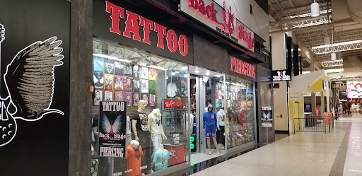 Explore dragonfly flower tattoo ideas, creative tattoo ideas in West Nyack, available at Backstage Tattoo & Piercing Palisades Mall