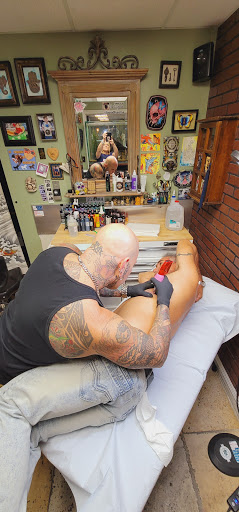 Tattoo Shop «Dharma Tattoo Studio», reviews and photos, 40 Curtiss Pkwy, Miami Springs, FL 33166, USA