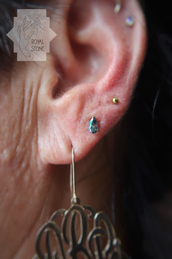 Explore small neck tattoo ideas, creative tattoo ideas in Mobile, available at Royal Stone Piercing