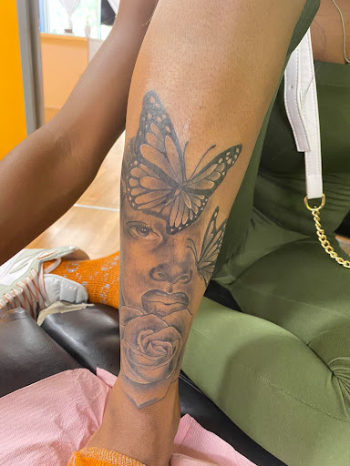 Find boyfriend name tattoo under breast ideas for your next unique tattoo in Chicago at Stencils Art Tattoos