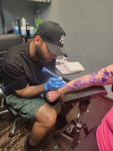 Explore leg tattoo ideas for men black, creative tattoo ideas in Fort Wayne, available at Grade A Tattoos and Body Piercing