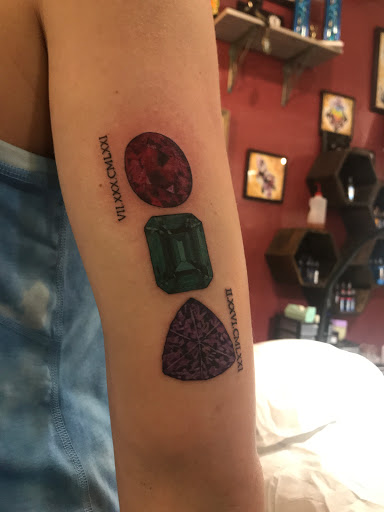 Explore tattoo cover ideas, creative tattoo ideas in Fargo, available at The Bees Nest Tattoo and Art Studio