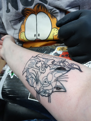 Find rib tattoo ideas for females for your next unique tattoo in Odenton at Naked Art Tattoos
