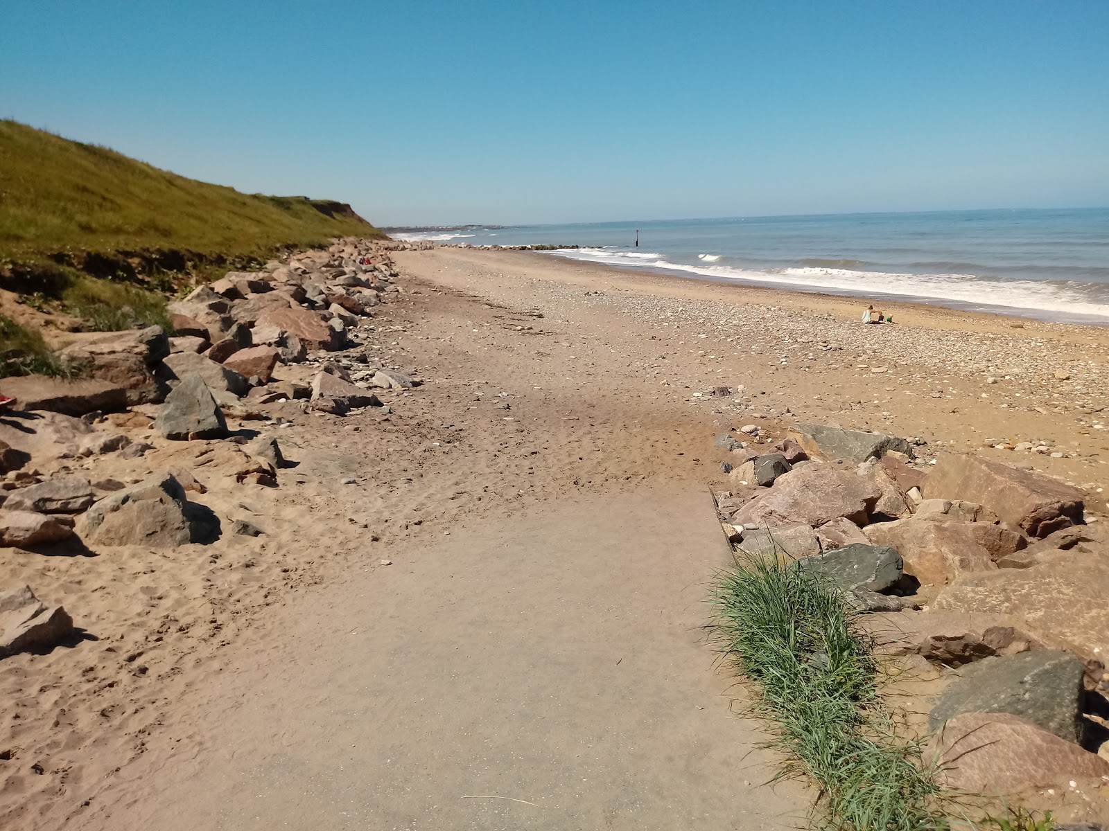 Foto van Mappleton strand en de nederzetting