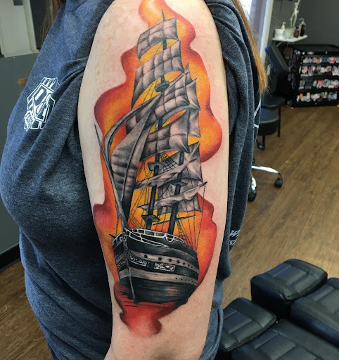 Explore tattoo ideas for swimmers, creative tattoo ideas in Abilene, available at Sacred Art