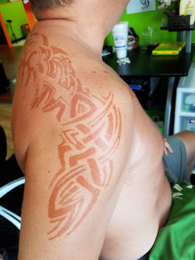 Explore tattoo ideas hands, creative tattoo ideas in Destin, available at Atomic Frog Tattoo