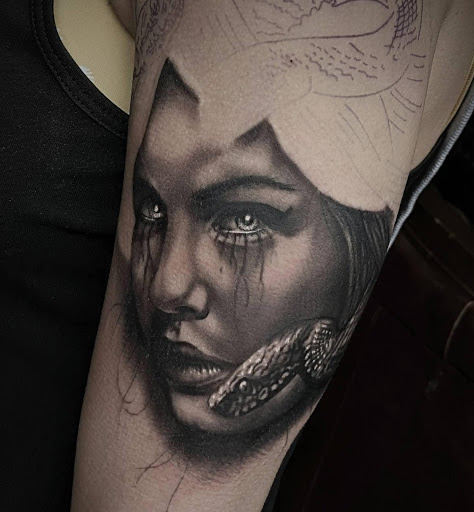 Explore small dog tattoos ideas, creative tattoo ideas in Lake Villa, available at Eternal Tiger Tattoo