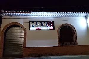 Maxó Comida Casera Cocinada en Leña image