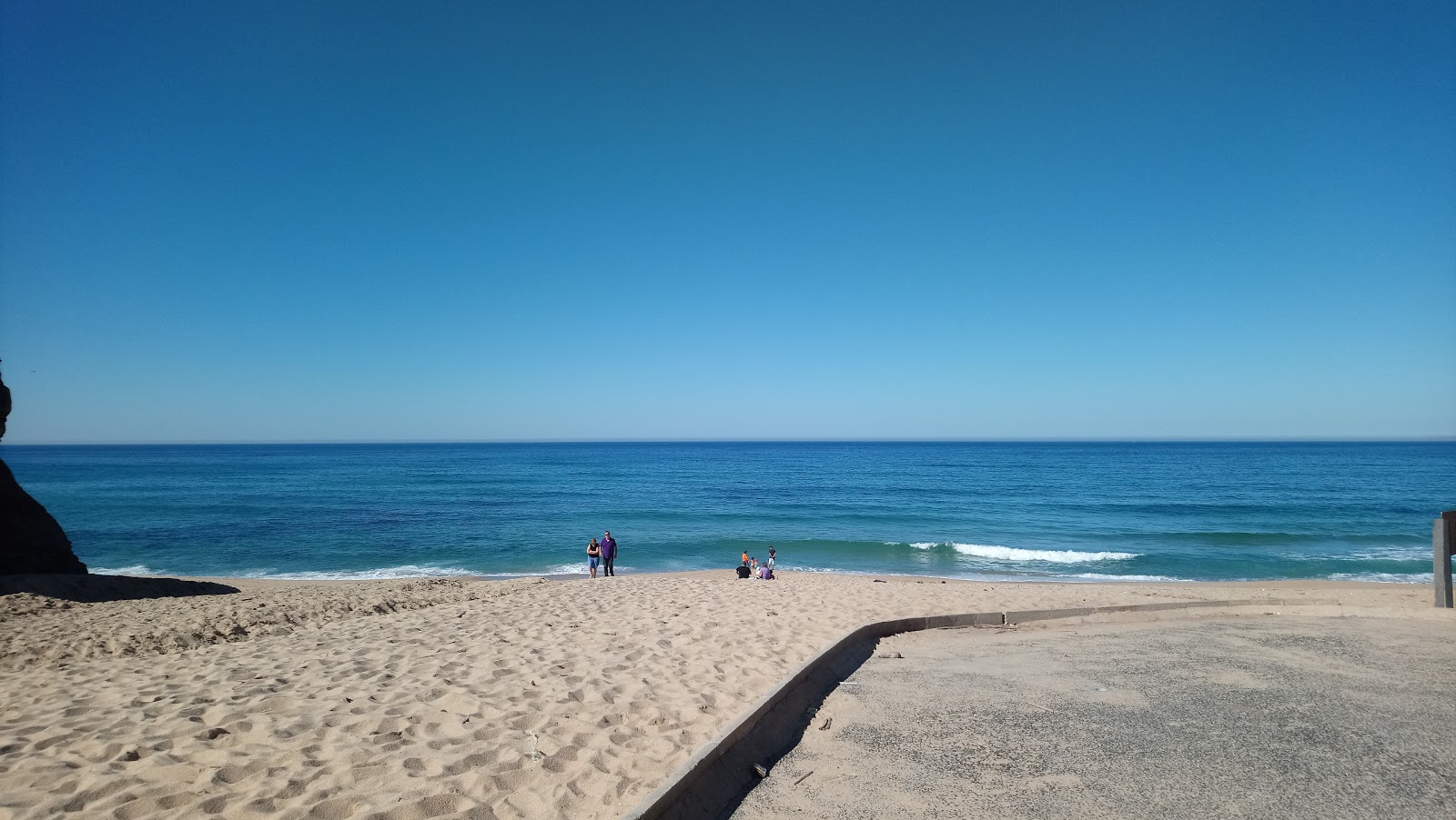 Photo of Praia de Valmitao and the settlement