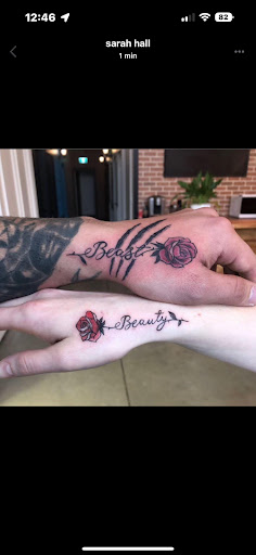 Explore female throat tattoo ideas, creative tattoo ideas in Elizabethtown, available at Electric Feel Tattoos