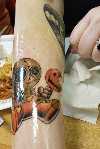 Explore fist tattoo ideas, creative tattoo ideas in Virginia Beach, available at Studio Evolve