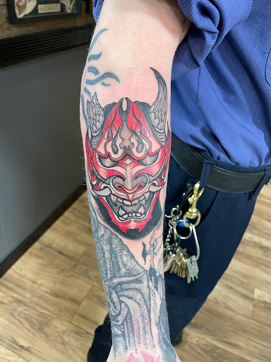 Explore tattoo ideas for football, creative tattoo ideas in Lees Summit, available at Bleeding Heart Tattoo