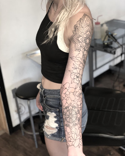 Explore swan tattoo ideas, creative tattoo ideas in Loveland, available at R&G Body Art