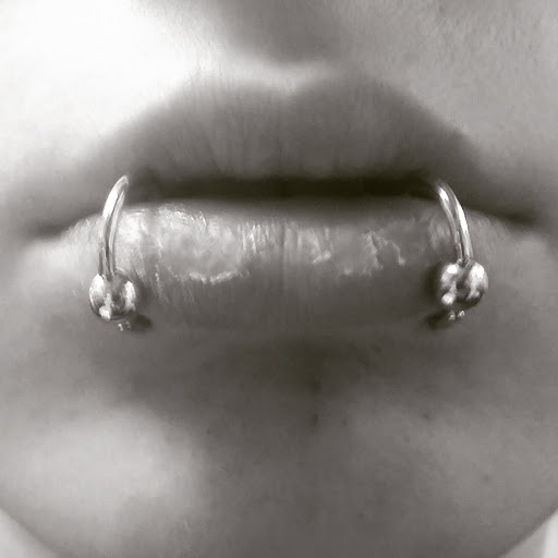 Explore sewing tattoo ideas, creative tattoo ideas in Albuquerque, available at Staceys Exotic Body Piercing and Tattoo