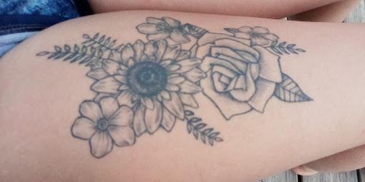 Explore small sleeve tattoo ideas, creative tattoo ideas in Reedsville, available at Rock Shop Tattoos