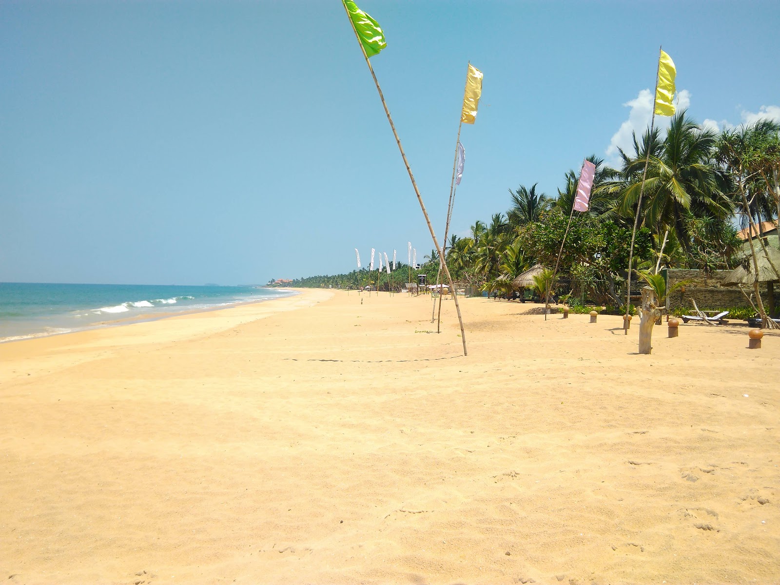 Fotografija Sabaidee Beach z dolga ravna obala