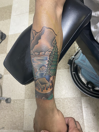 Explore butterfly and rose tattoo ideas, creative tattoo ideas in Sparks, available at Tidal Wave Tattoo