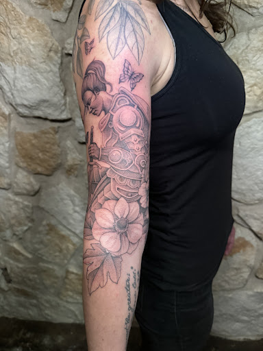 Explore finger tattoo ideas for guys, creative tattoo ideas in Austin, available at Black Swan Tattoo Company