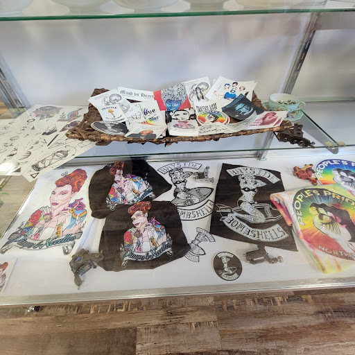 Find tropical flower tattoo ideas for your next unique tattoo in Traverse City at Pinups & Needles