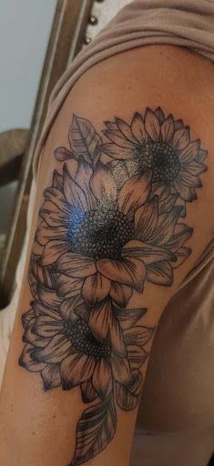 Explore hand tattoo ideas for guys, creative tattoo ideas in Whitman, available at Xotic Creations Tattoo