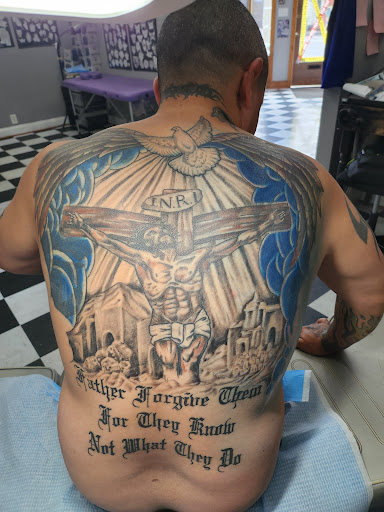 Explore tattoo ideas for spine, creative tattoo ideas in Martinsburg, available at Cherry Bomb Tattoo