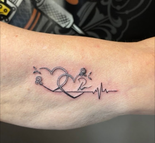 Explore barber pole tattoo ideas, creative tattoo ideas in Houston, available at 333 Tattoo Studio HTX