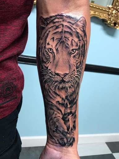 Explore karol g tattoo ideas, creative tattoo ideas in Zephyrhills, available at Lions Den Tattoo Company