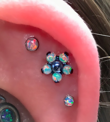 Explore tattoo ideas for upper arm, creative tattoo ideas in Springfield, available at Body Piercing By Qui Qui