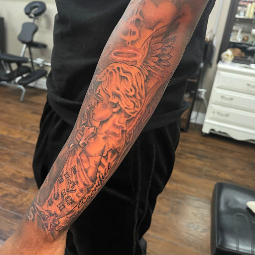 Explore calf tattoo ideas men, creative tattoo ideas in Roanoke, available at Saint Cecilias Art Studio