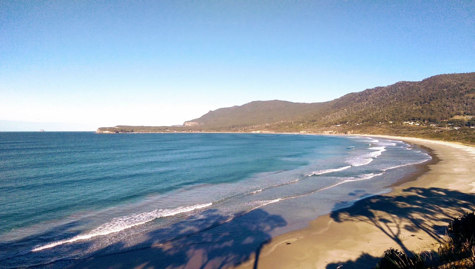Photo of Sloping Main Beach with long bay