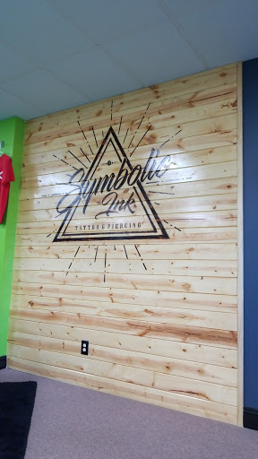 Explore split personality tattoo ideas, creative tattoo ideas in Foley, available at Symbolic Ink Tattoo Studio