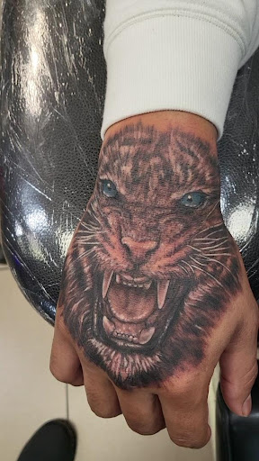 Explore dirty hands clean money tattoo ideas, creative tattoo ideas in Sarasota, available at SEVEN SINS Tattoo Studio