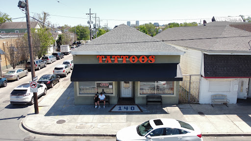 Explore rapper tattoos ideas, creative tattoo ideas in New Orleans, available at Mid City Voodoux Tattoos