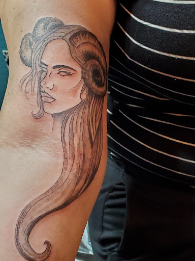 Explore skull neck tattoo ideas, creative tattoo ideas in Albuquerque, available at Iron Anchor Tattoo Parlour