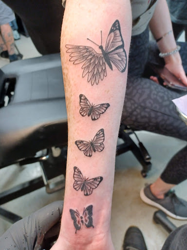 Explore tattoo ideas for first born son, creative tattoo ideas in Alexandria, available at Turtles Ink