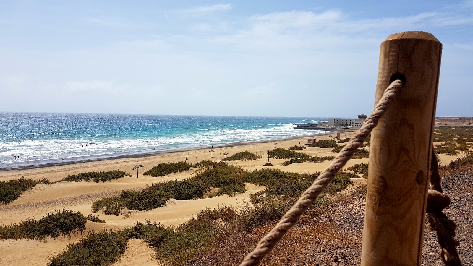 Zdjęcie Playa Blanca z powierzchnią jasny, drobny piasek