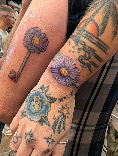 Explore autism heart tattoo ideas, creative tattoo ideas in Fountain, available at United Tattoo