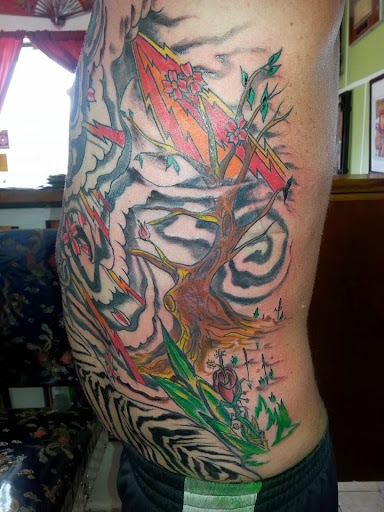 Explore cover up ideas for big tattoos, creative tattoo ideas in Englewood, available at The Original Big Daddy Tattoo & Body Piercing est.1997 est.1997