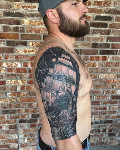 Explore tattoo ideas behind the ear, creative tattoo ideas in Talbott, available at Alpha Tattoo co.