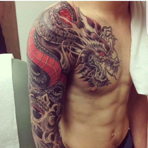 Explore cover up tattoo ideas on hand, creative tattoo ideas in Fort Wayne, available at Grade A Tattoos and Body Piercing